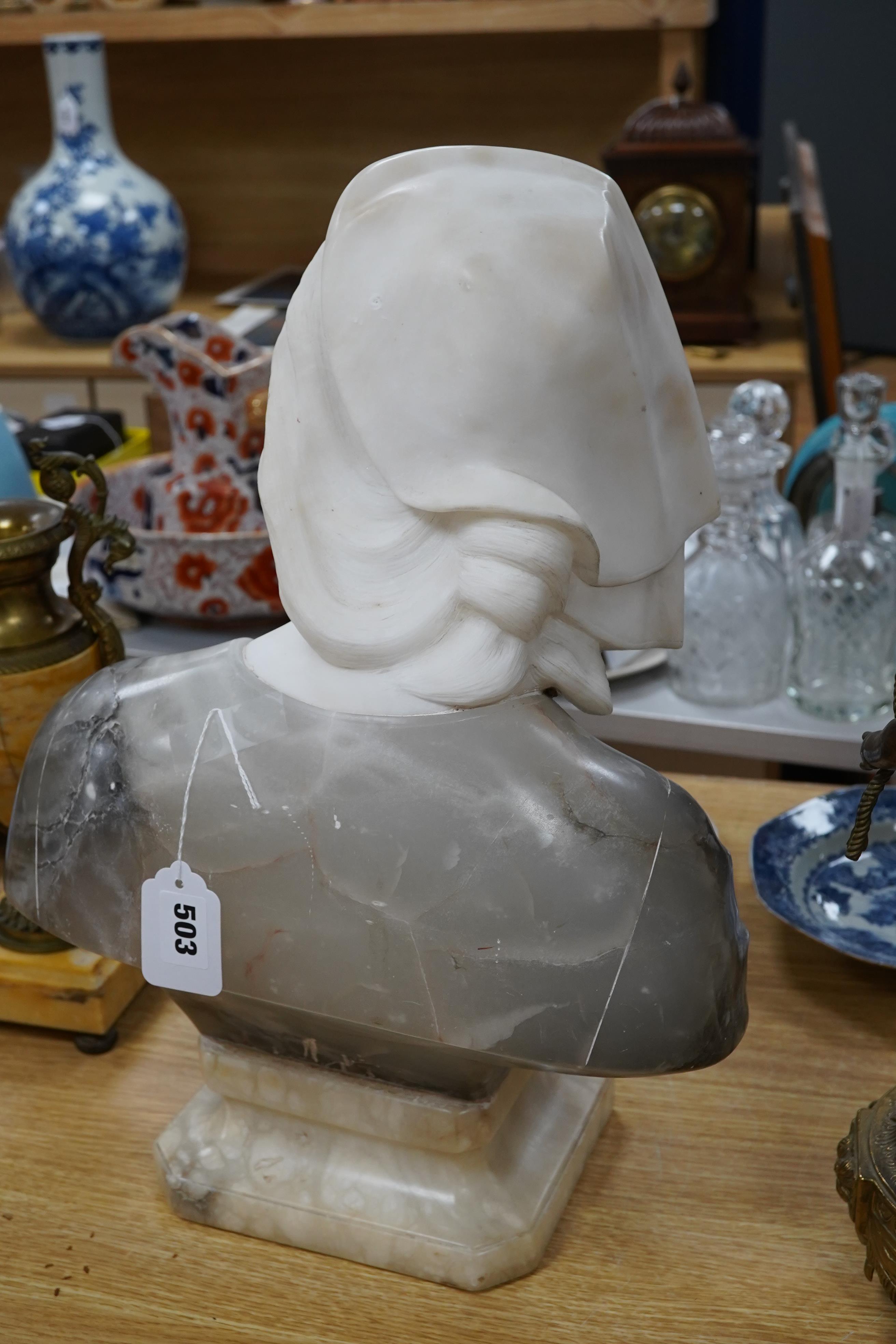 A French variegated alabaster bust of a young woman, 47cm high. Condition - scratch to top side of left cheek